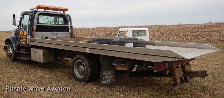 image for item EK9158 1999 International 4700 rollback tow truck
