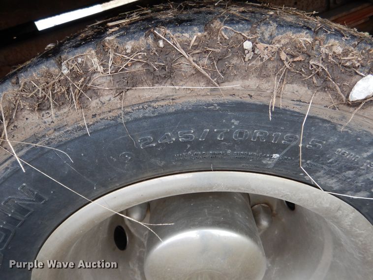 image for item EK9158 1999 International 4700 rollback tow truck