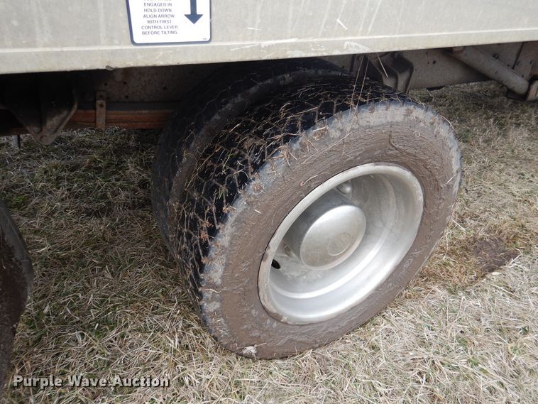 image for item EK9158 1999 International 4700 rollback tow truck