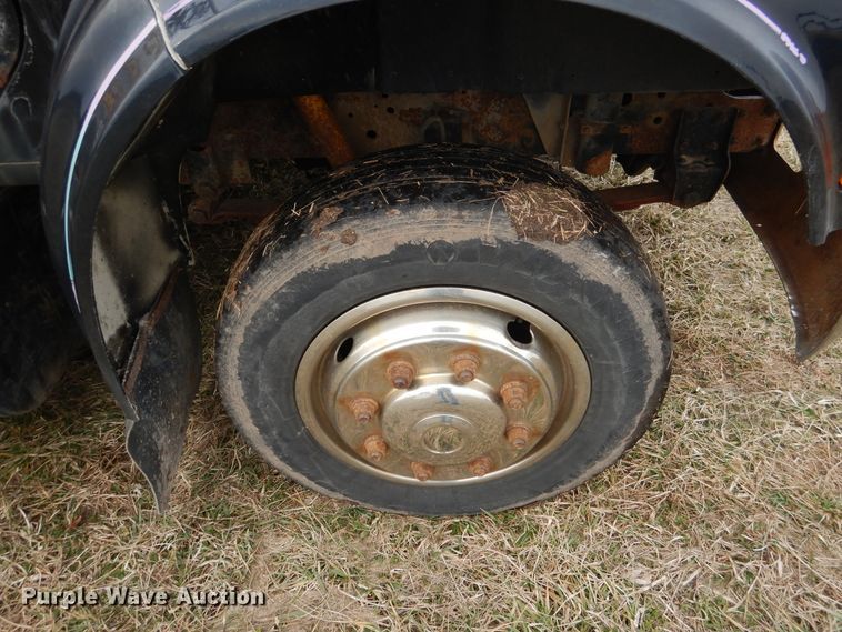 image for item EK9158 1999 International 4700 rollback tow truck