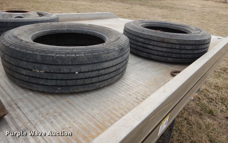 image for item EK9158 1999 International 4700 rollback tow truck