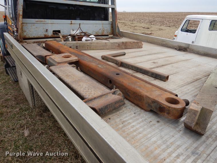 image for item EK9158 1999 International 4700 rollback tow truck