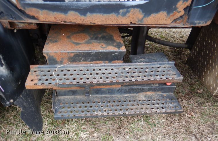 image for item EK9158 1999 International 4700 rollback tow truck