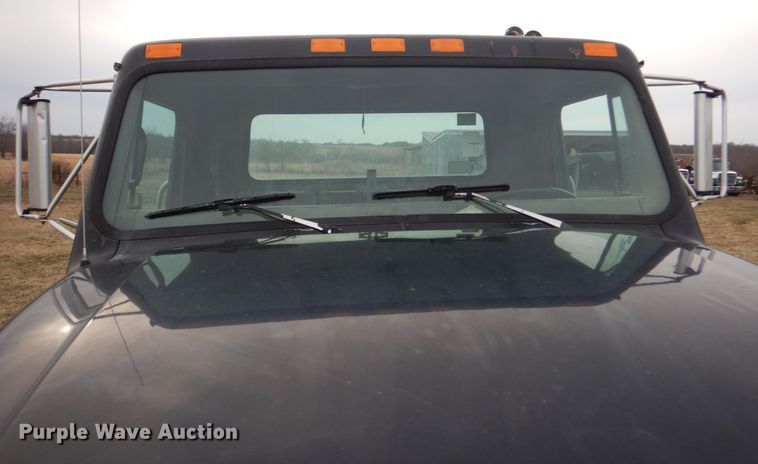 image for item EK9158 1999 International 4700 rollback tow truck