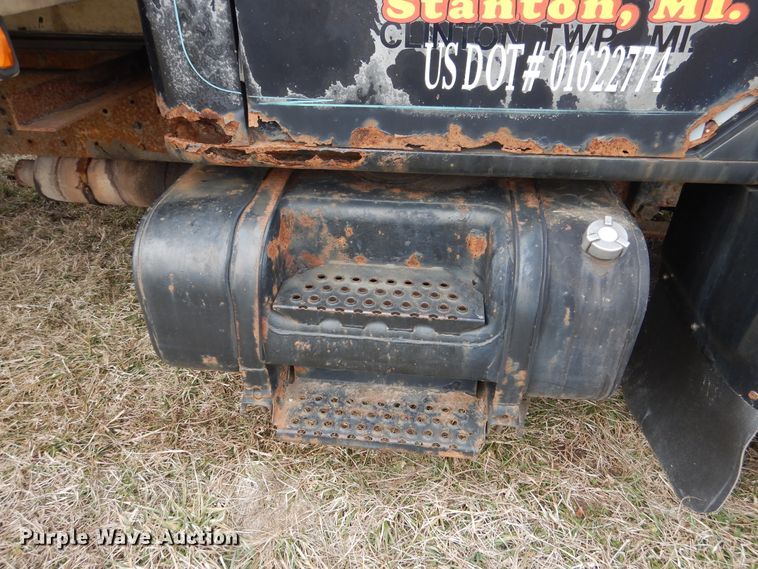 image for item EK9158 1999 International 4700 rollback tow truck