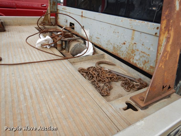 image for item EK9158 1999 International 4700 rollback tow truck