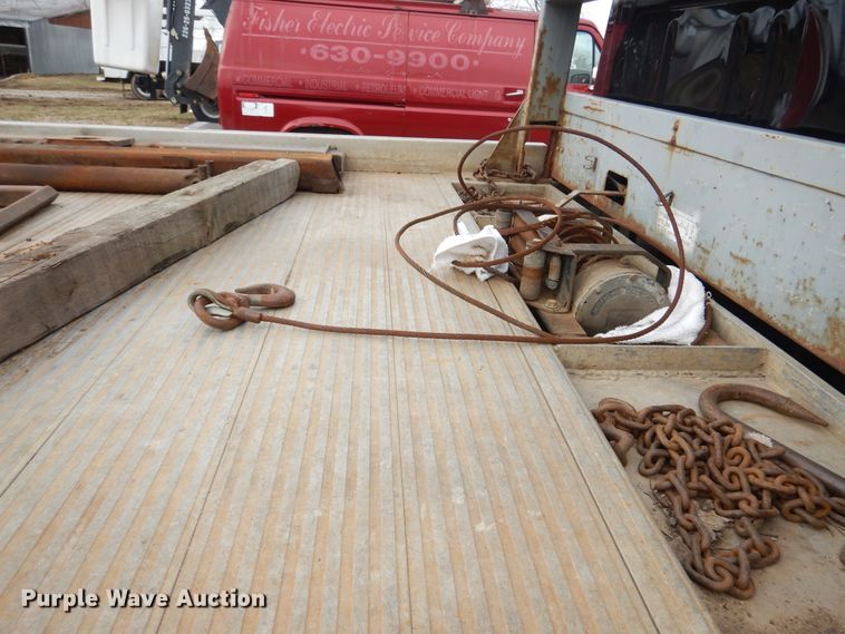 image for item EK9158 1999 International 4700 rollback tow truck