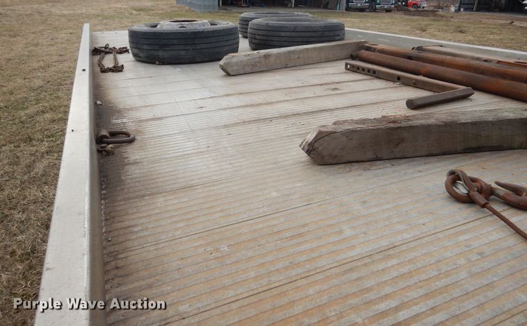 image for item EK9158 1999 International 4700 rollback tow truck