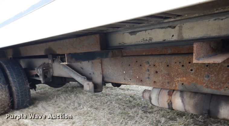 image for item EK9158 1999 International 4700 rollback tow truck