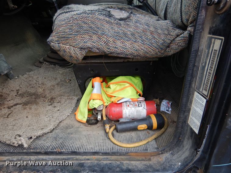 image for item EK9158 1999 International 4700 rollback tow truck