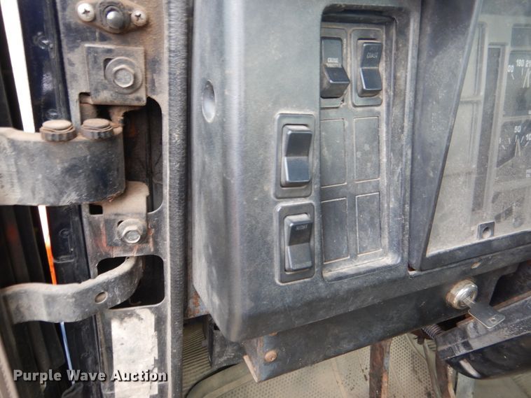 image for item EK9158 1999 International 4700 rollback tow truck