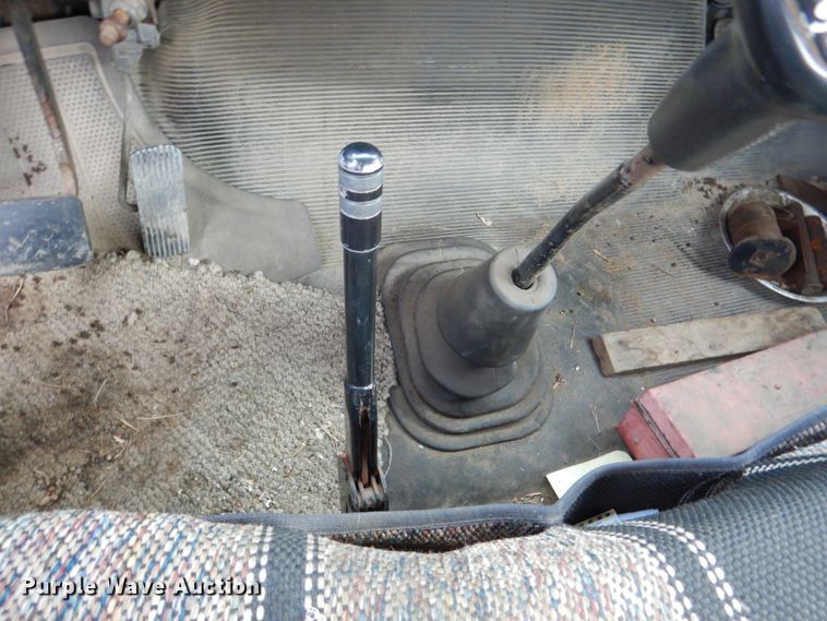 image for item EK9158 1999 International 4700 rollback tow truck