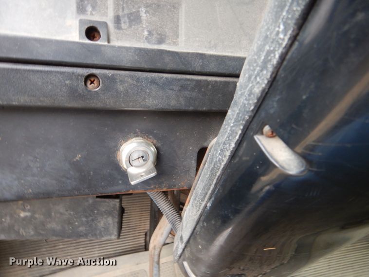 image for item EK9158 1999 International 4700 rollback tow truck