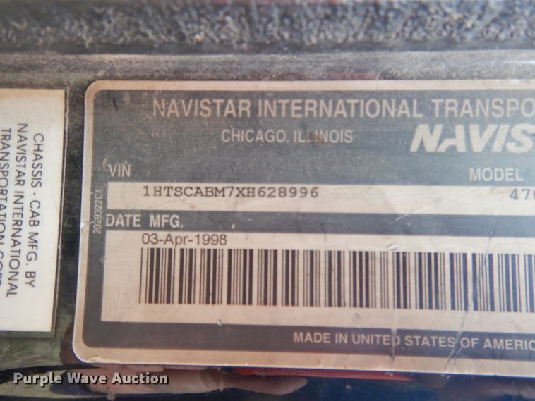 image for item EK9158 1999 International 4700 rollback tow truck