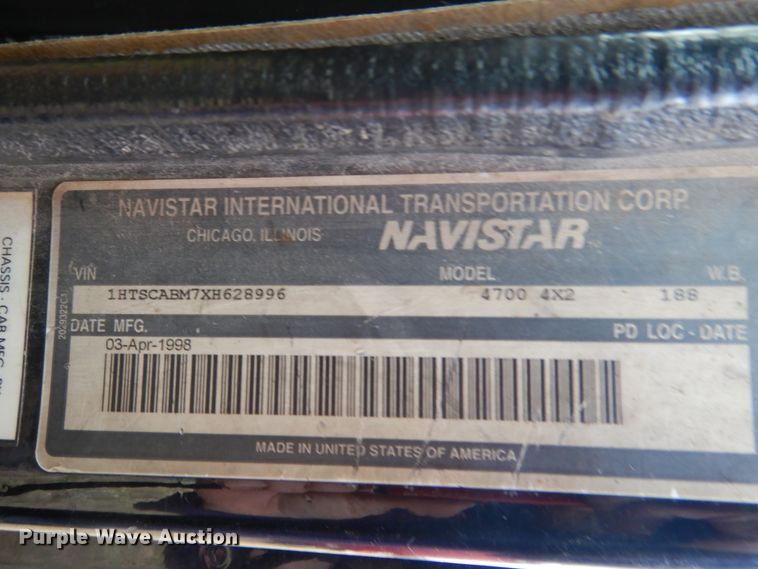 image for item EK9158 1999 International 4700 rollback tow truck