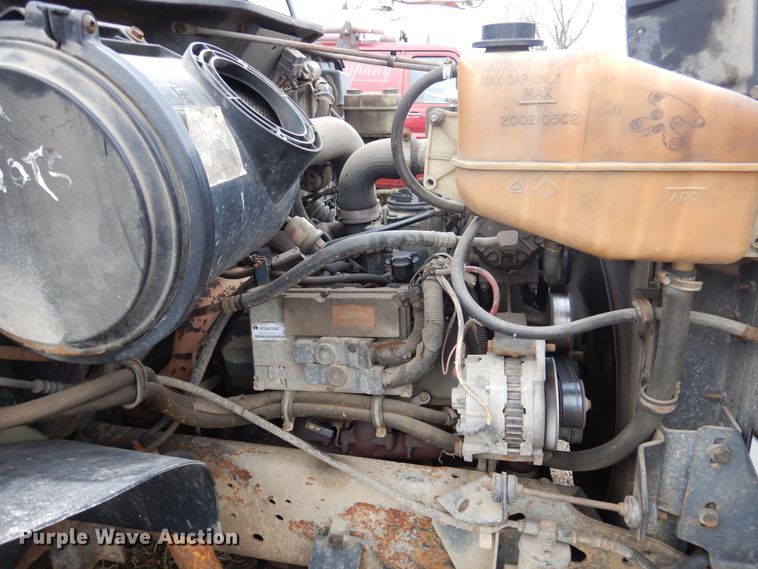 image for item EK9158 1999 International 4700 rollback tow truck