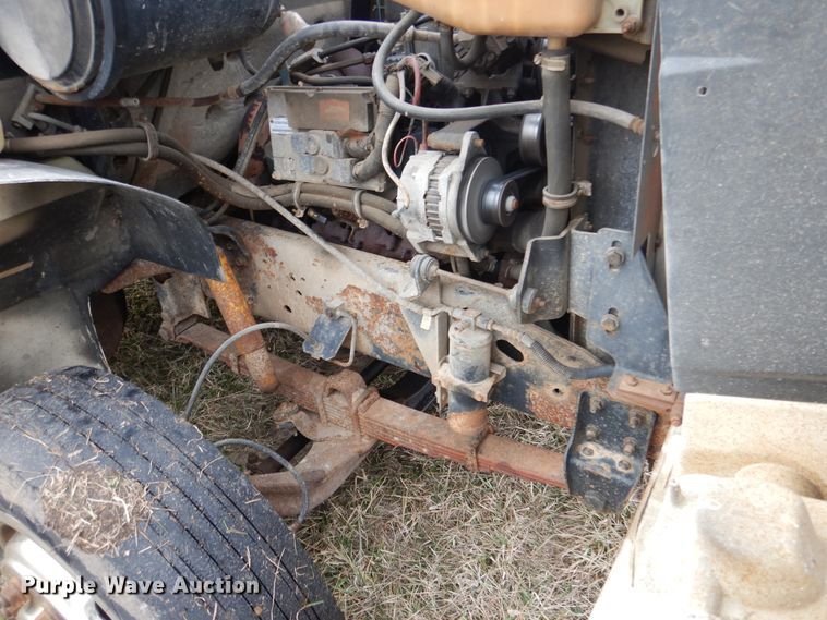 image for item EK9158 1999 International 4700 rollback tow truck