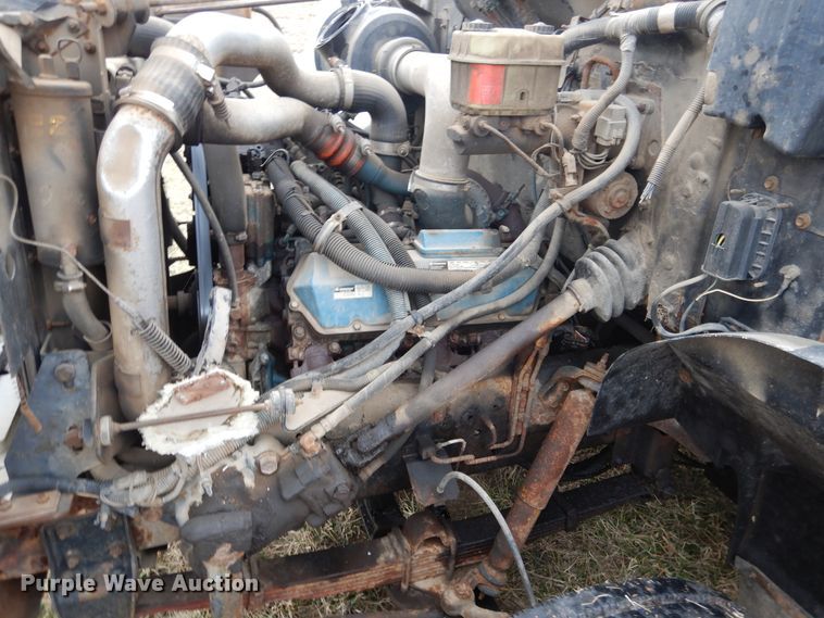 image for item EK9158 1999 International 4700 rollback tow truck