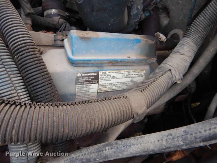 image for item EK9158 1999 International 4700 rollback tow truck