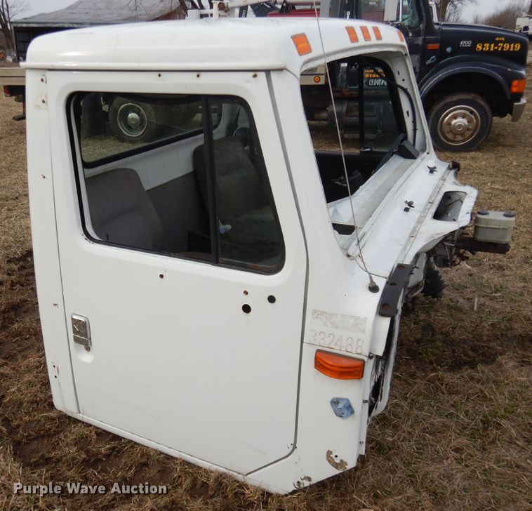 image for item EK9158 1999 International 4700 rollback tow truck