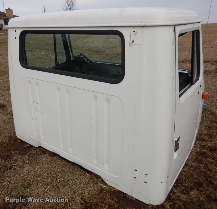 image for item EK9158 1999 International 4700 rollback tow truck