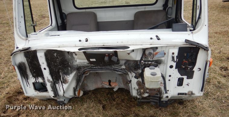 image for item EK9158 1999 International 4700 rollback tow truck