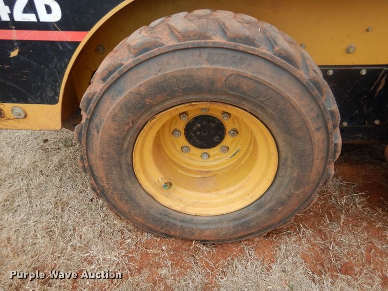 image for item GE9046 2004 Caterpillar 242B skid steer