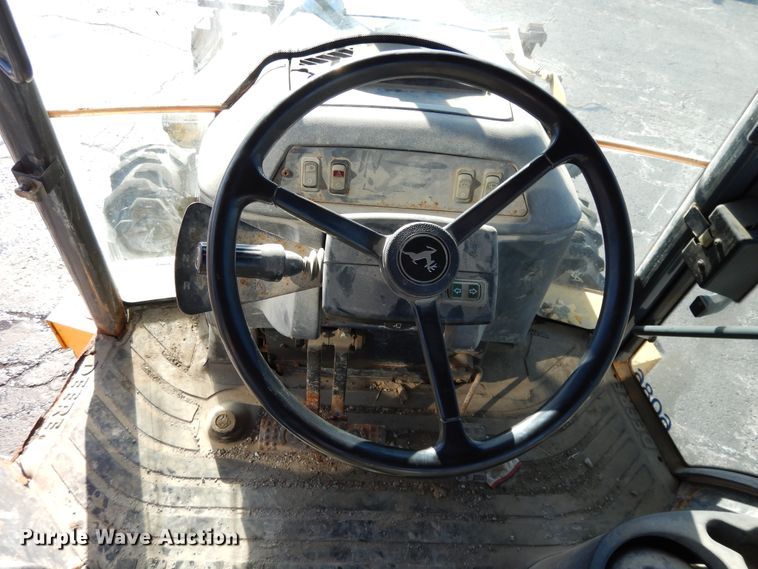 image for item DF5938 2003 John Deere 410G backhoe