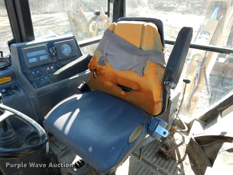 image for item DG6300 Ford 675D backhoe