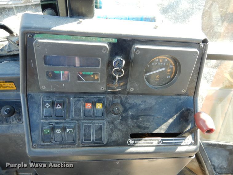 image for item DG6300 Ford 675D backhoe