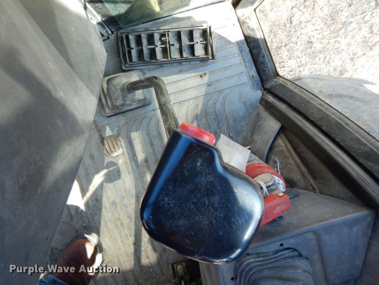 image for item DG6300 Ford 675D backhoe