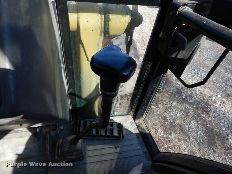 image for item DG6300 Ford 675D backhoe