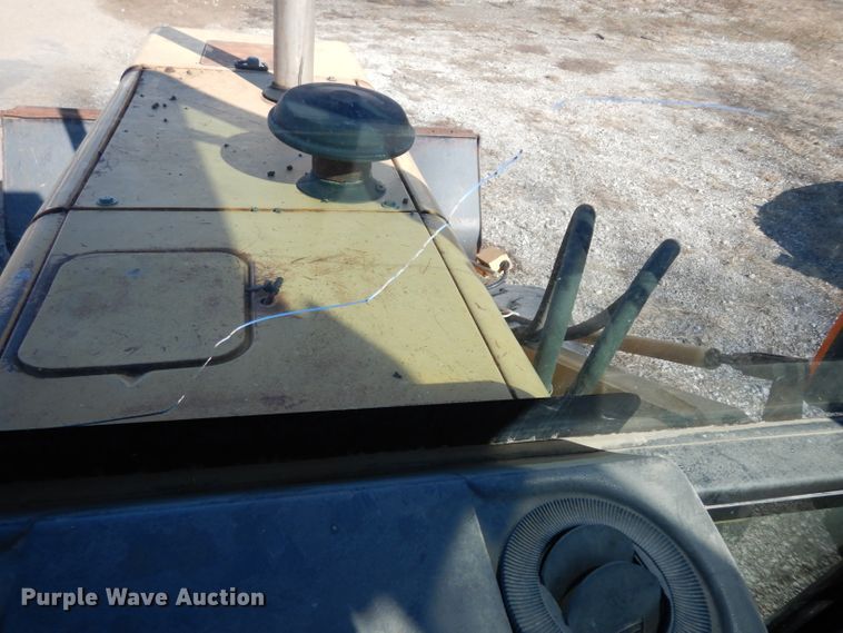 image for item DG6300 Ford 675D backhoe