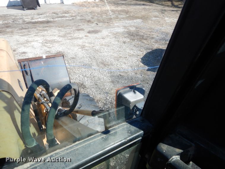 image for item DG6300 Ford 675D backhoe