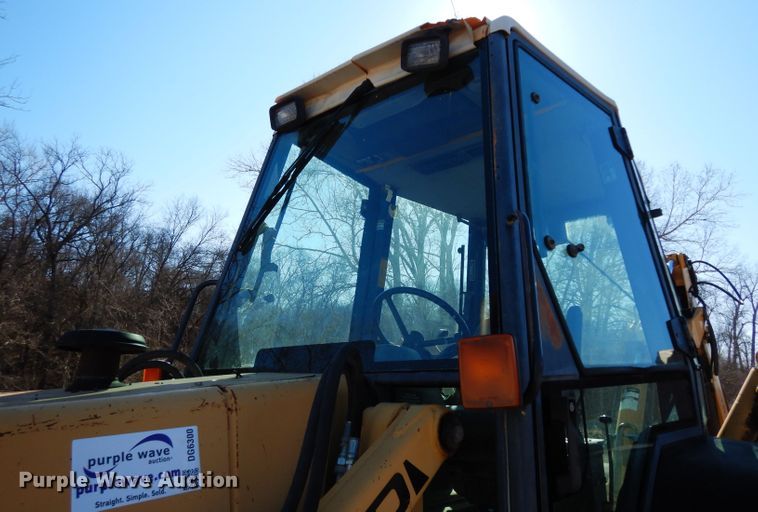 image for item DG6300 Ford 675D backhoe