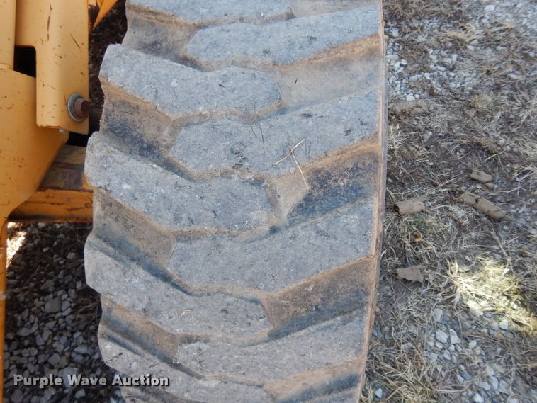 image for item DG6300 Ford 675D backhoe