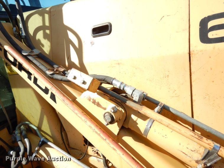 image for item DG6300 Ford 675D backhoe