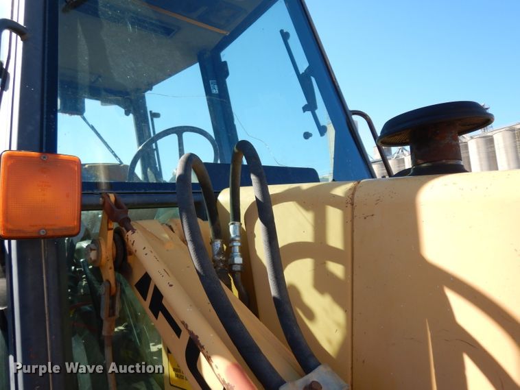 image for item DG6300 Ford 675D backhoe