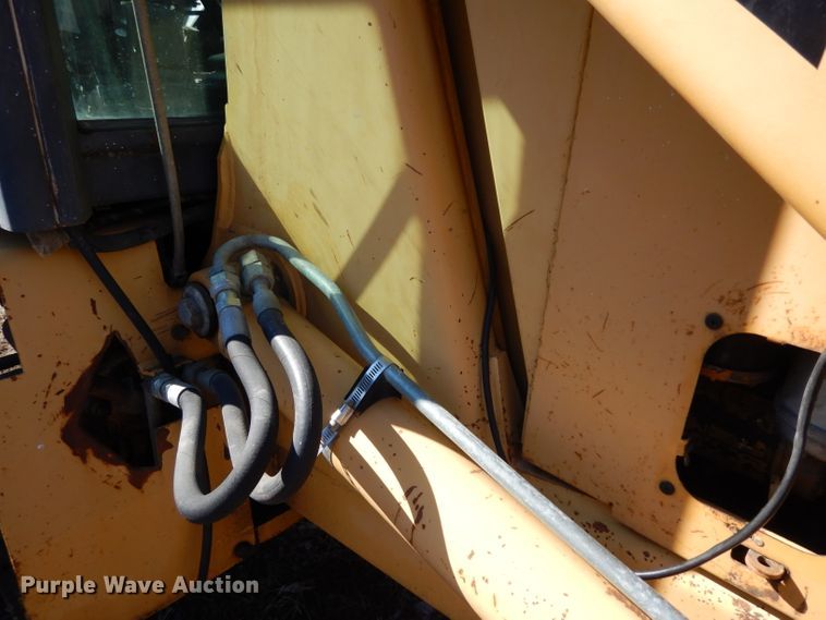 image for item DG6300 Ford 675D backhoe