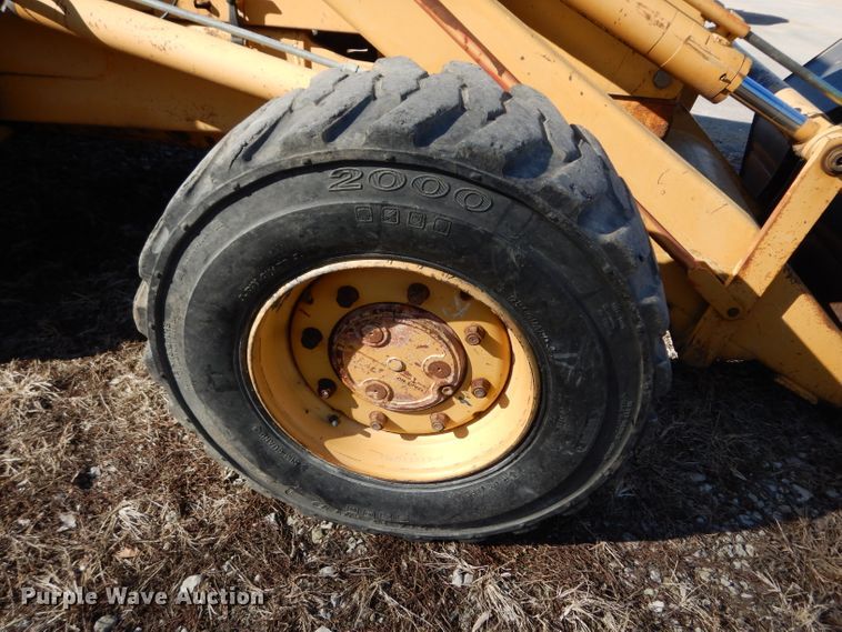 image for item DG6300 Ford 675D backhoe