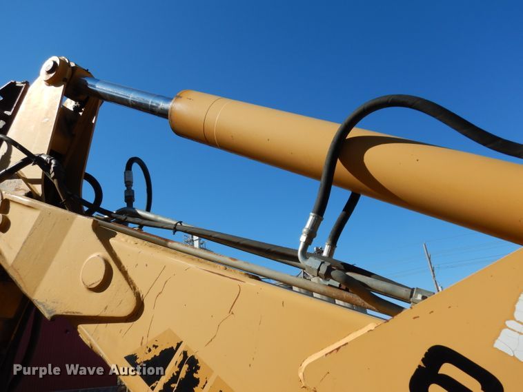 image for item DG6300 Ford 675D backhoe