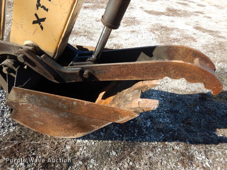 image for item DG6300 Ford 675D backhoe