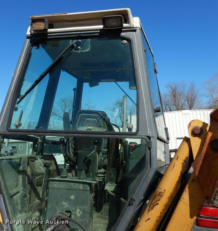 image for item DG6300 Ford 675D backhoe