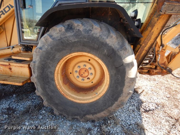 image for item DG6300 Ford 675D backhoe