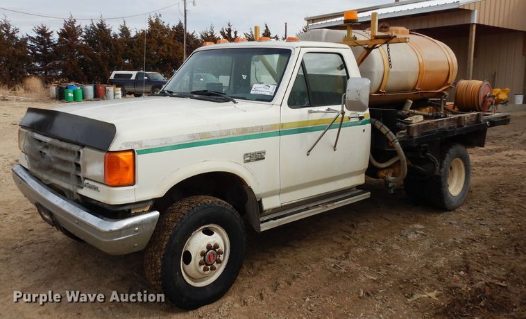 image for item DG6335 1991 Ford F350 flatbed truck with sprayer