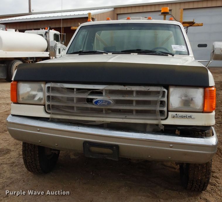 image for item DG6335 1991 Ford F350 flatbed truck with sprayer