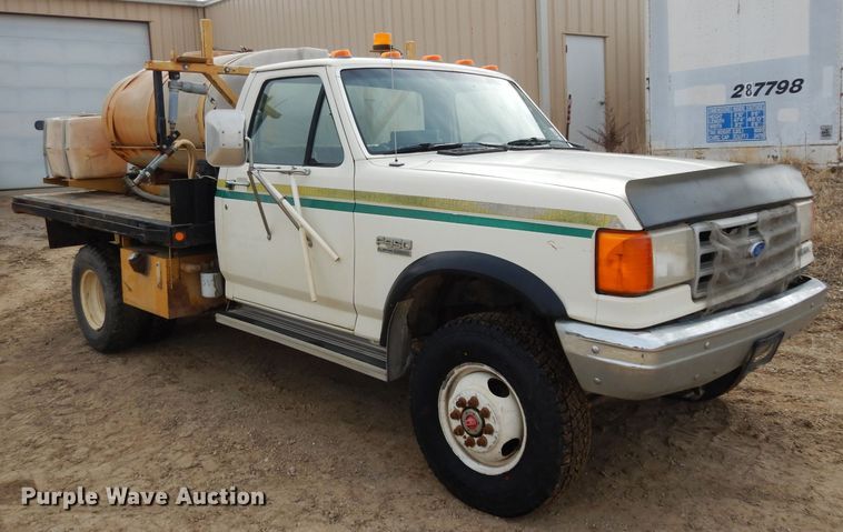 image for item DG6335 1991 Ford F350 flatbed truck with sprayer