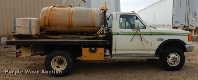 image for item DG6335 1991 Ford F350 flatbed truck with sprayer