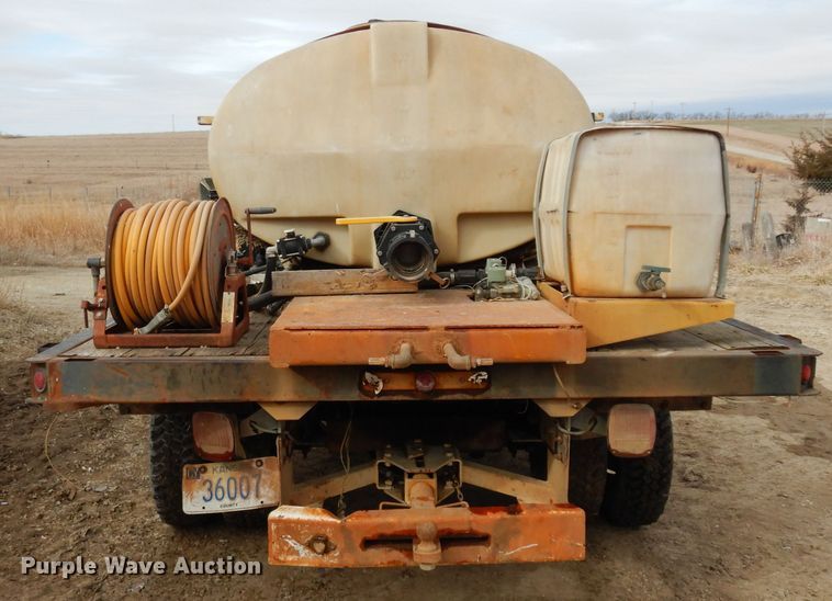image for item DG6335 1991 Ford F350 flatbed truck with sprayer