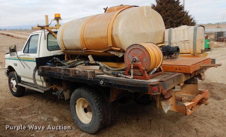 image for item DG6335 1991 Ford F350 flatbed truck with sprayer